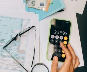 Tax Classes in Germany calculator and glasses on a table